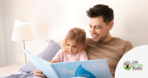 Father reading bedtime stories to daughter